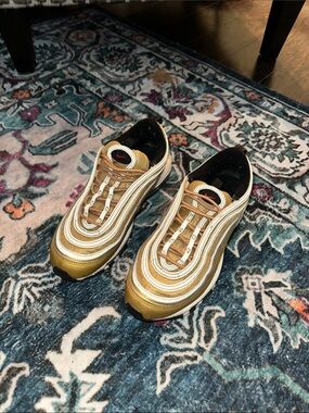 Nike Women’s Air Max 97 Sneakers in Metallic Gold and White